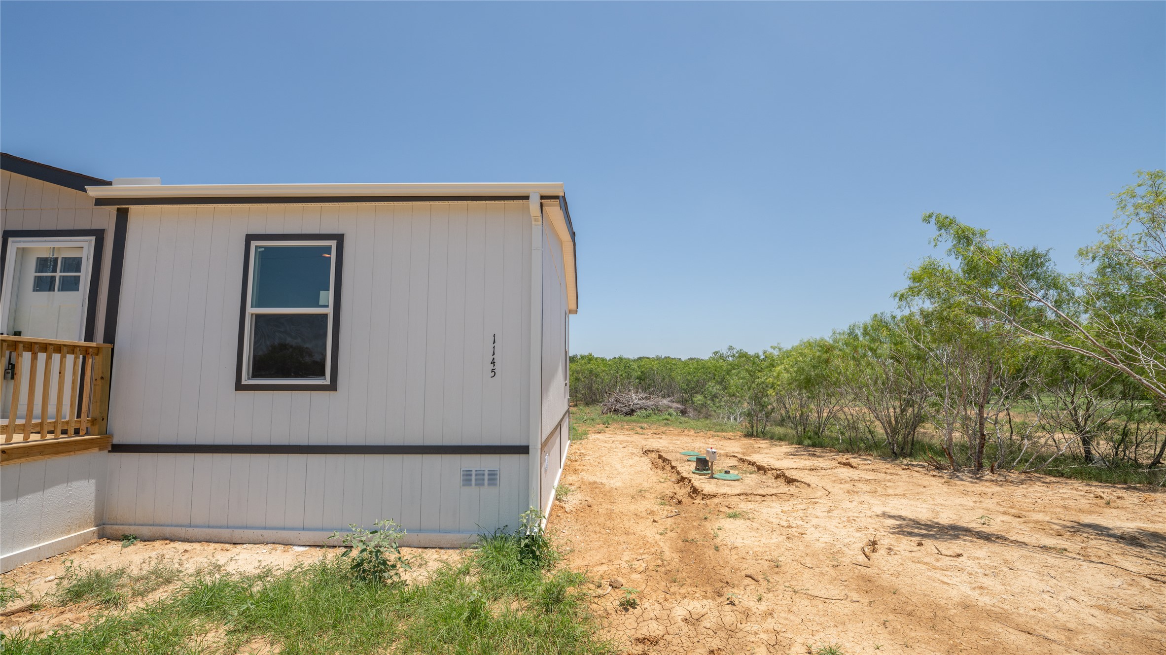 1145 Callihan Road Luling, TX 78648 - Photo 3 of 39 a view of a backyard of the house