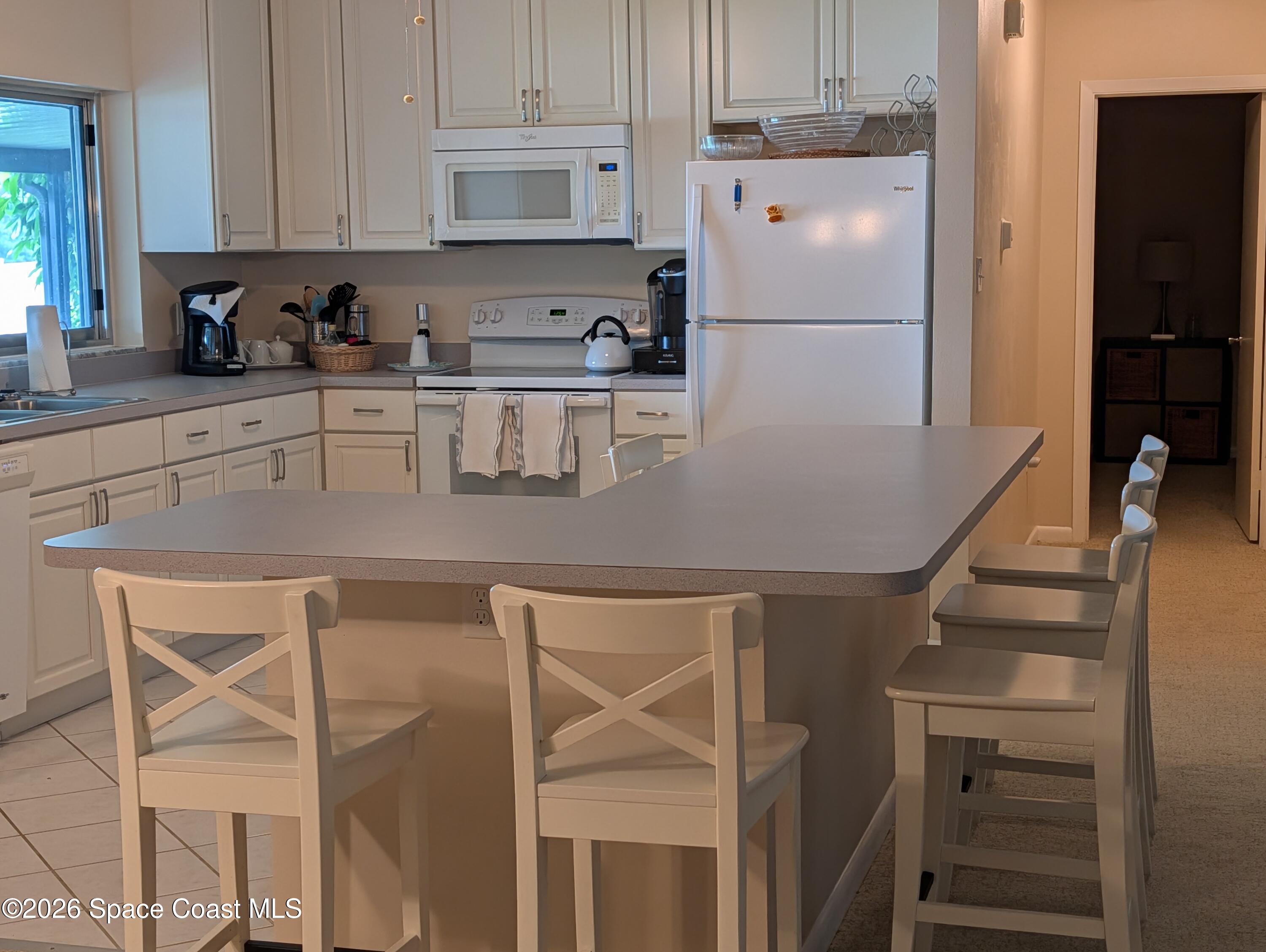 597 Capri Road Cocoa Beach, FL 32931 - Photo 6 of 33 PXL_20260609_170529269