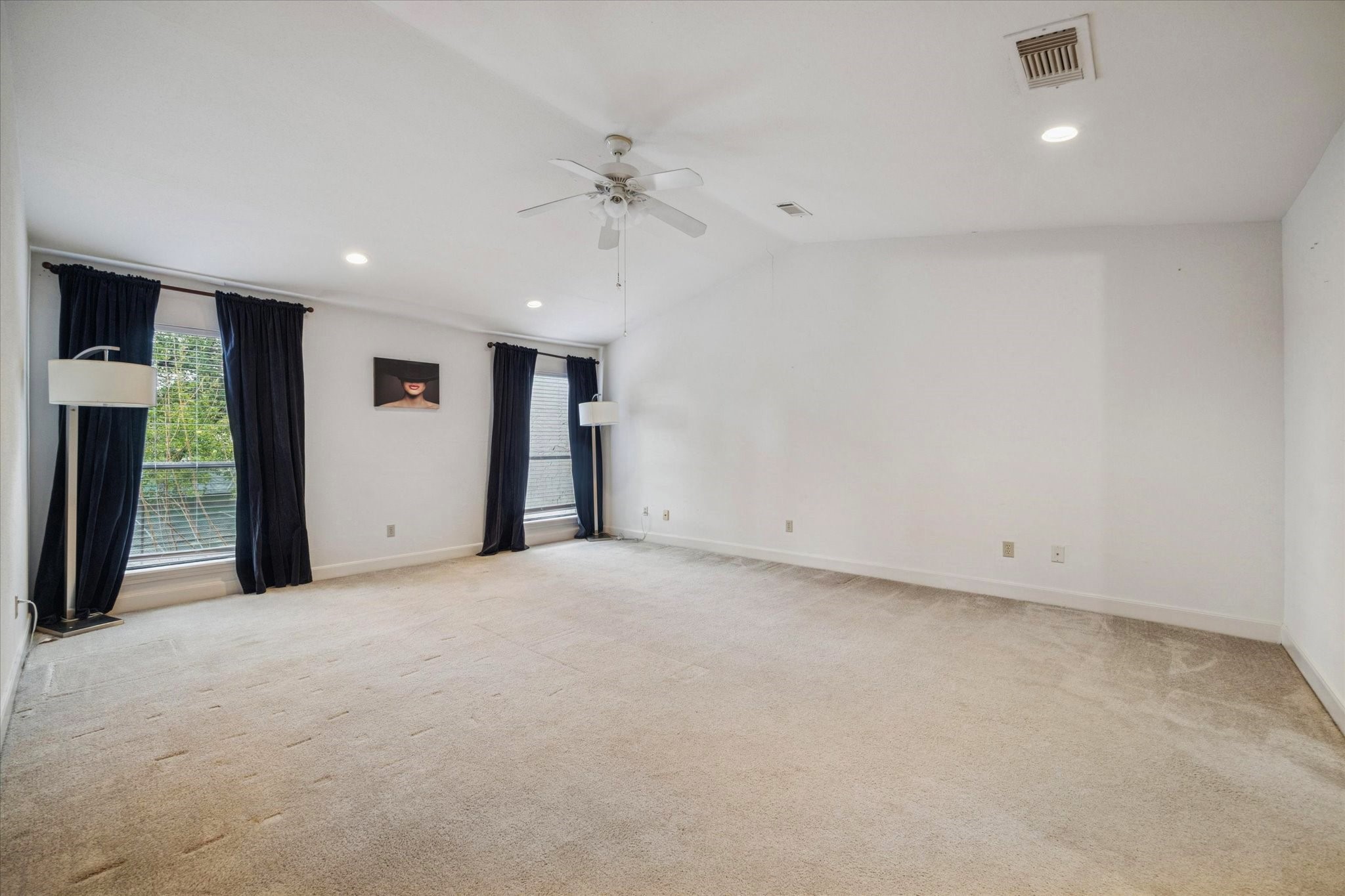 880 Tully Street, Unit 13 Houston, TX 77079 - Photo 15 of 27 a view of an empty room with a window