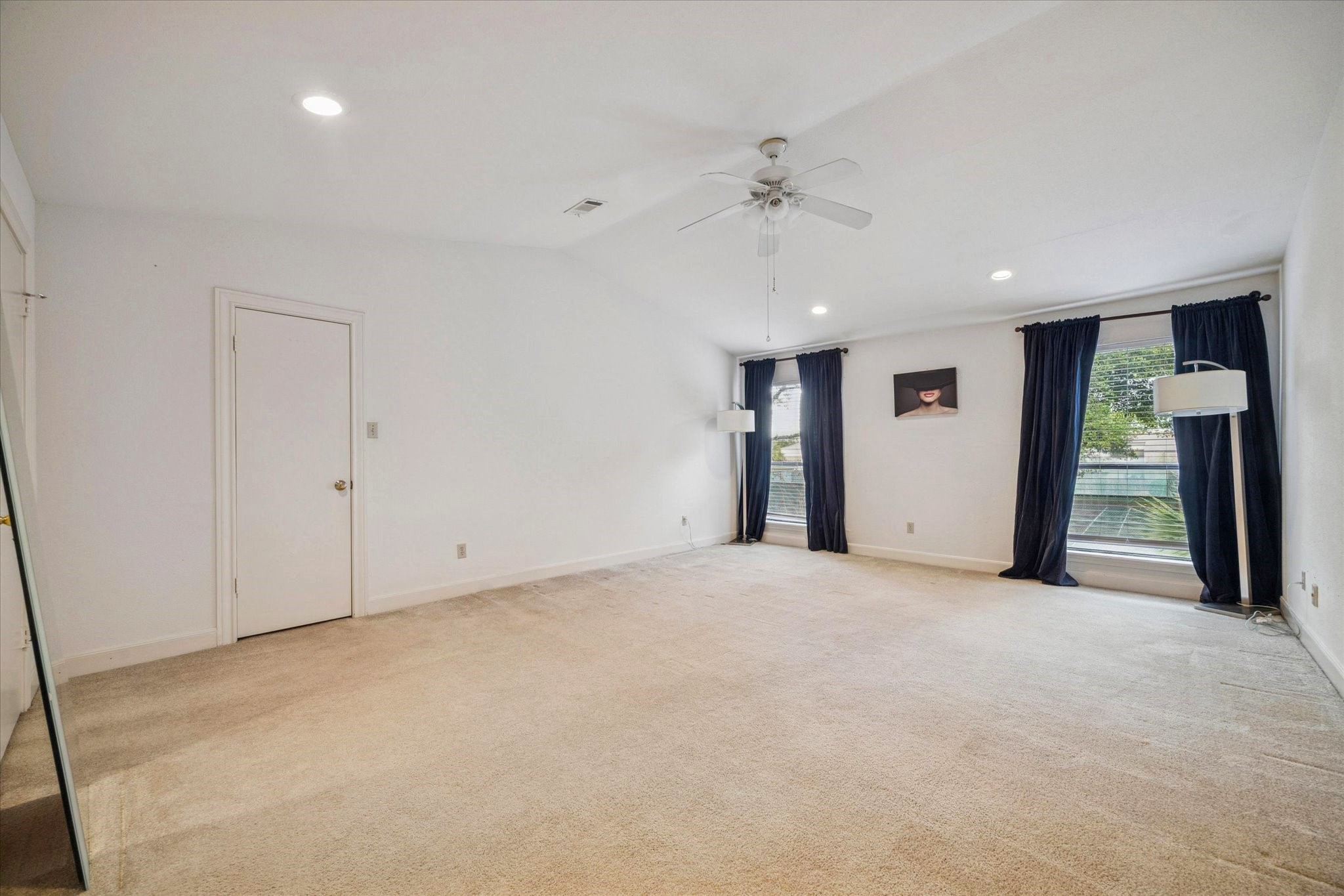 880 Tully Street, Unit 13 Houston, TX 77079 - Photo 16 of 27 a view of an empty room with glass door
