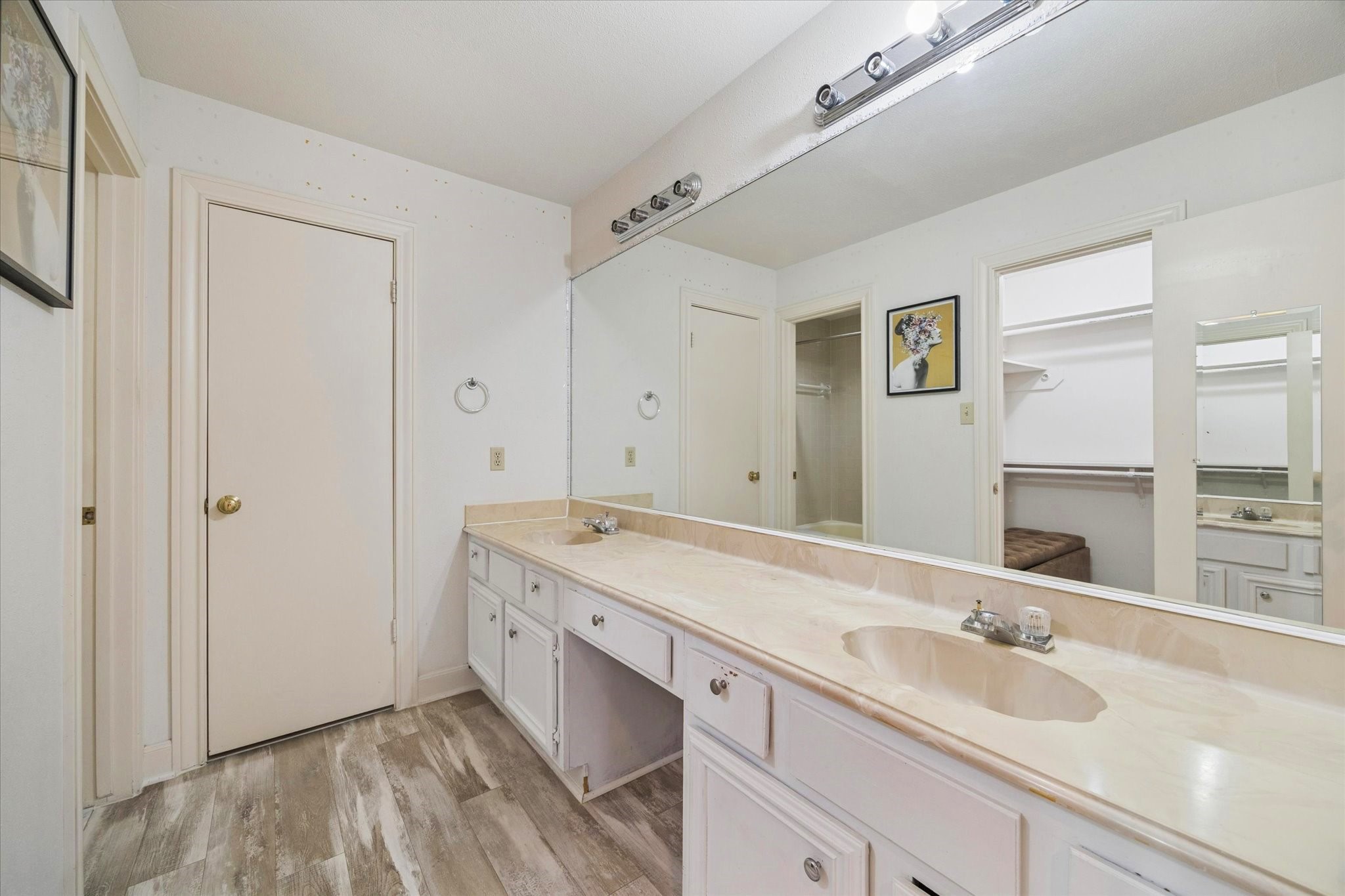 880 Tully Street, Unit 13 Houston, TX 77079 - Photo 18 of 27 a bathroom with a sink and a mirror