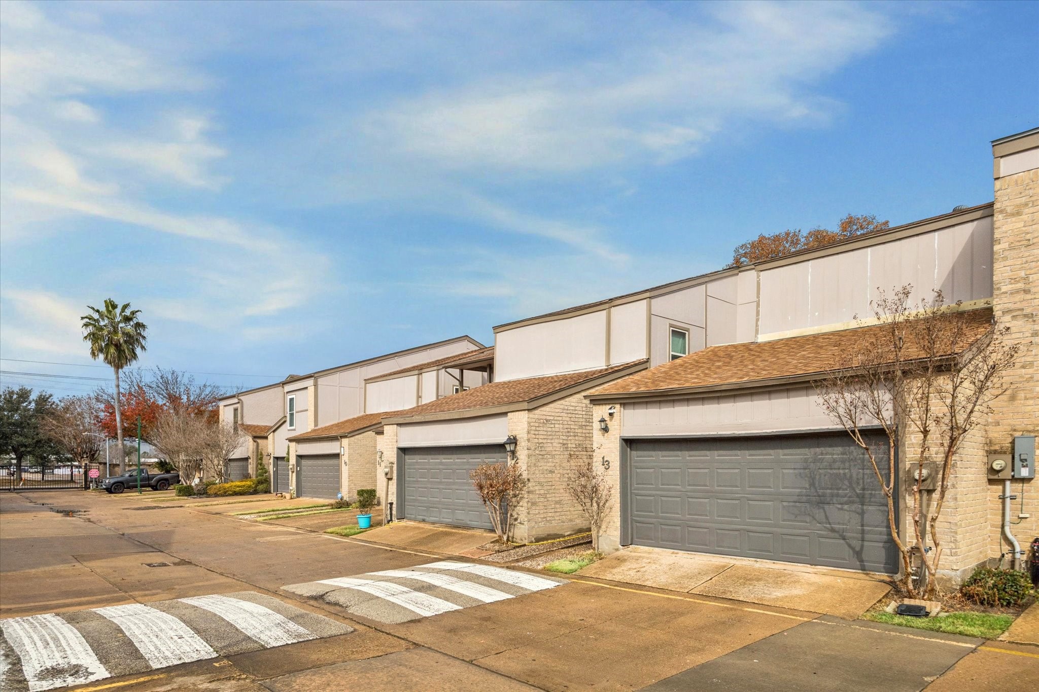 880 Tully Street, Unit 13 Houston, TX 77079 - Photo 4 of 27 a view of a white building