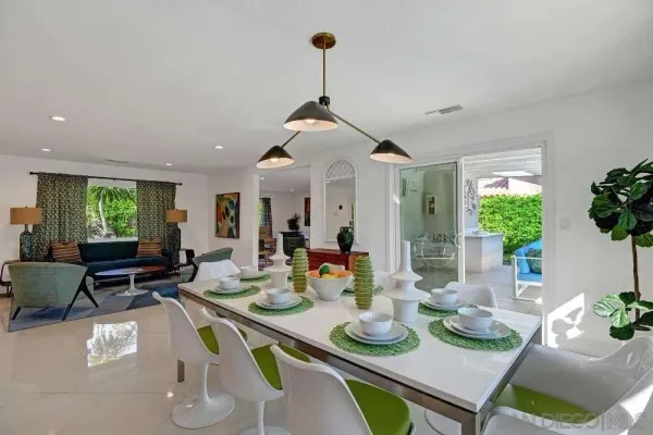a kitchen with cabinets a sink and appliances
