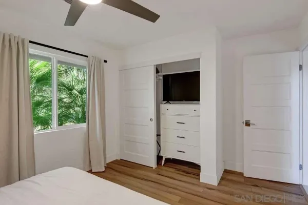 a bathroom with a shower and a sink
