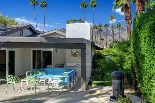 a view of a swimming pool with a patio