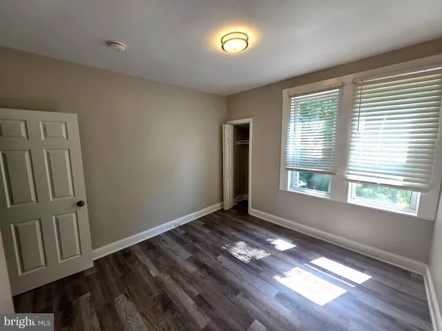 a bathroom with a sink toilet a shower and a mirror