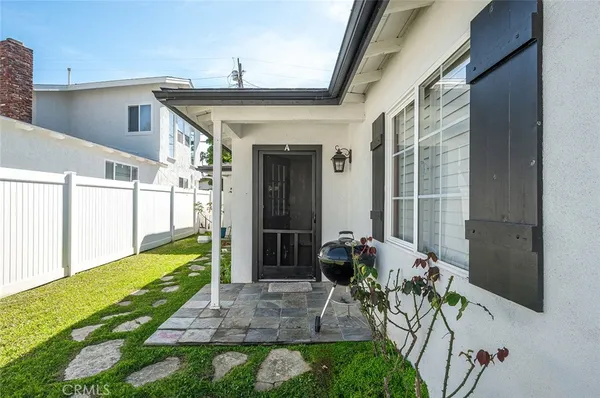 a view of yard with patio