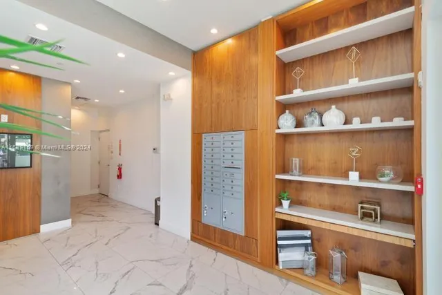an aerial view of a house with a swimming pool outdoor seating and yard