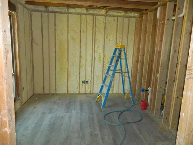 a view of a room with a fireplace