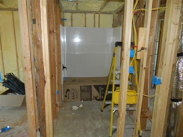 a view of an empty room with a window