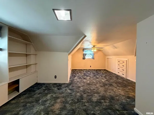 a bathroom with a double vanity sink and mirror