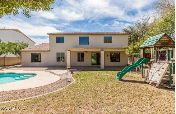 a house view with a swimming pool
