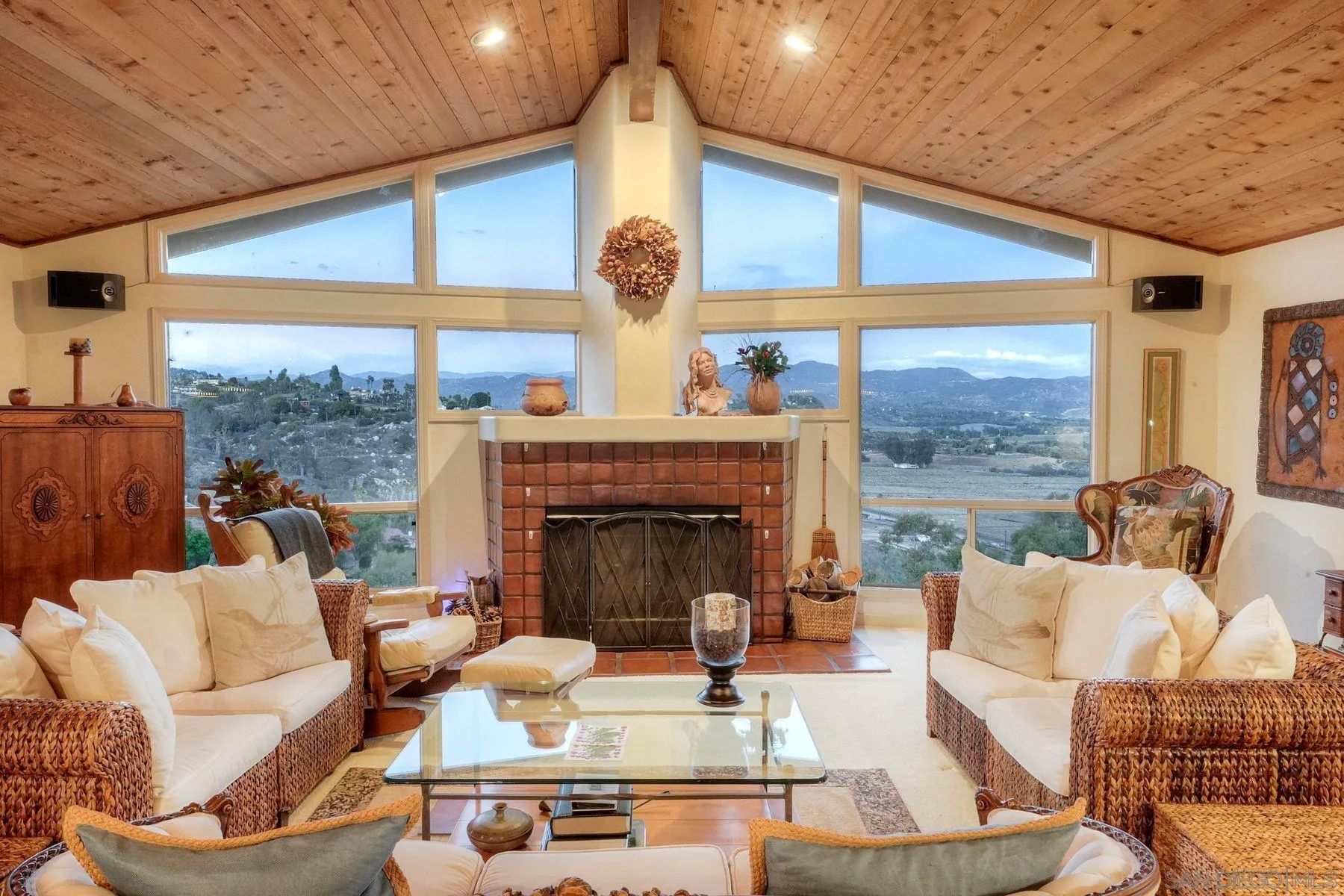 2848 Sunset Hills Escondido, CA 92025 - Photo 17 of 67 a living room with furniture fireplace and large windows