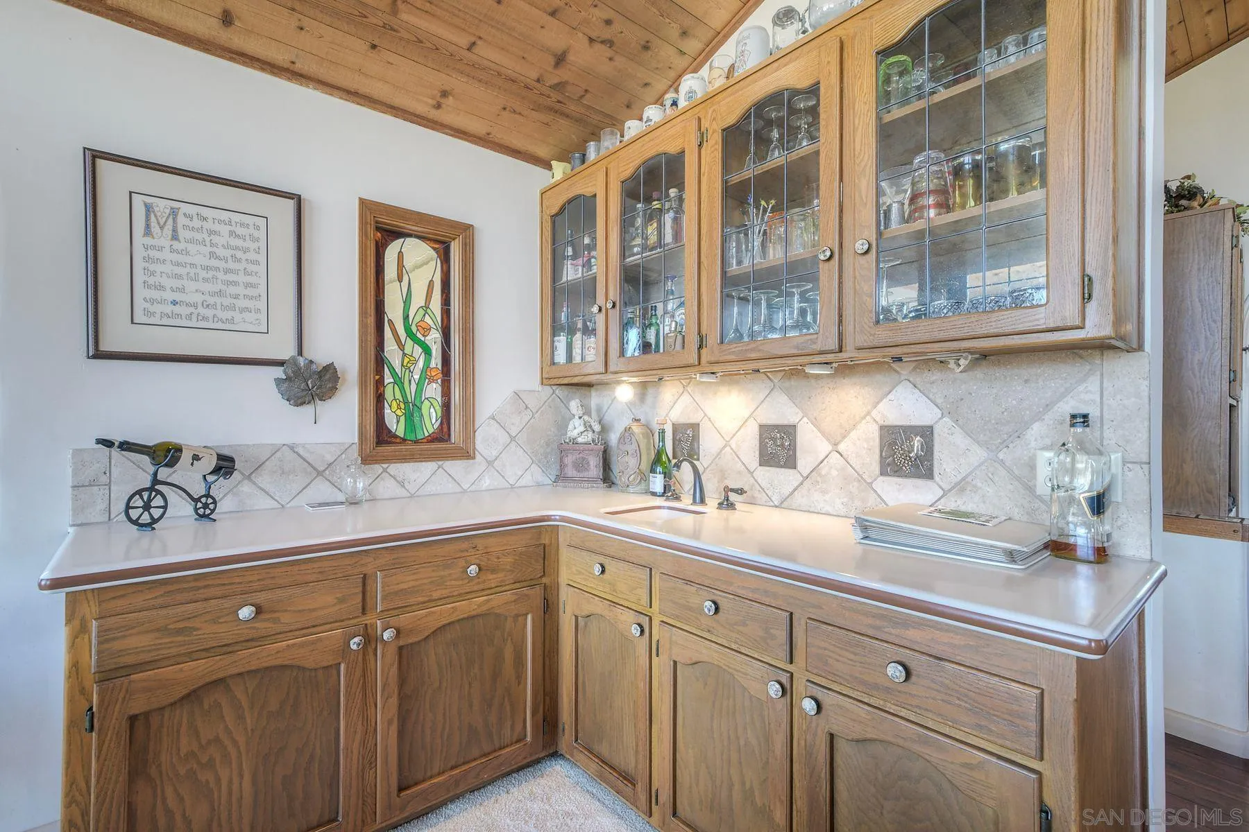 2848 Sunset Hills Escondido, CA 92025 - Photo 19 of 67 a kitchen with cabinets and window