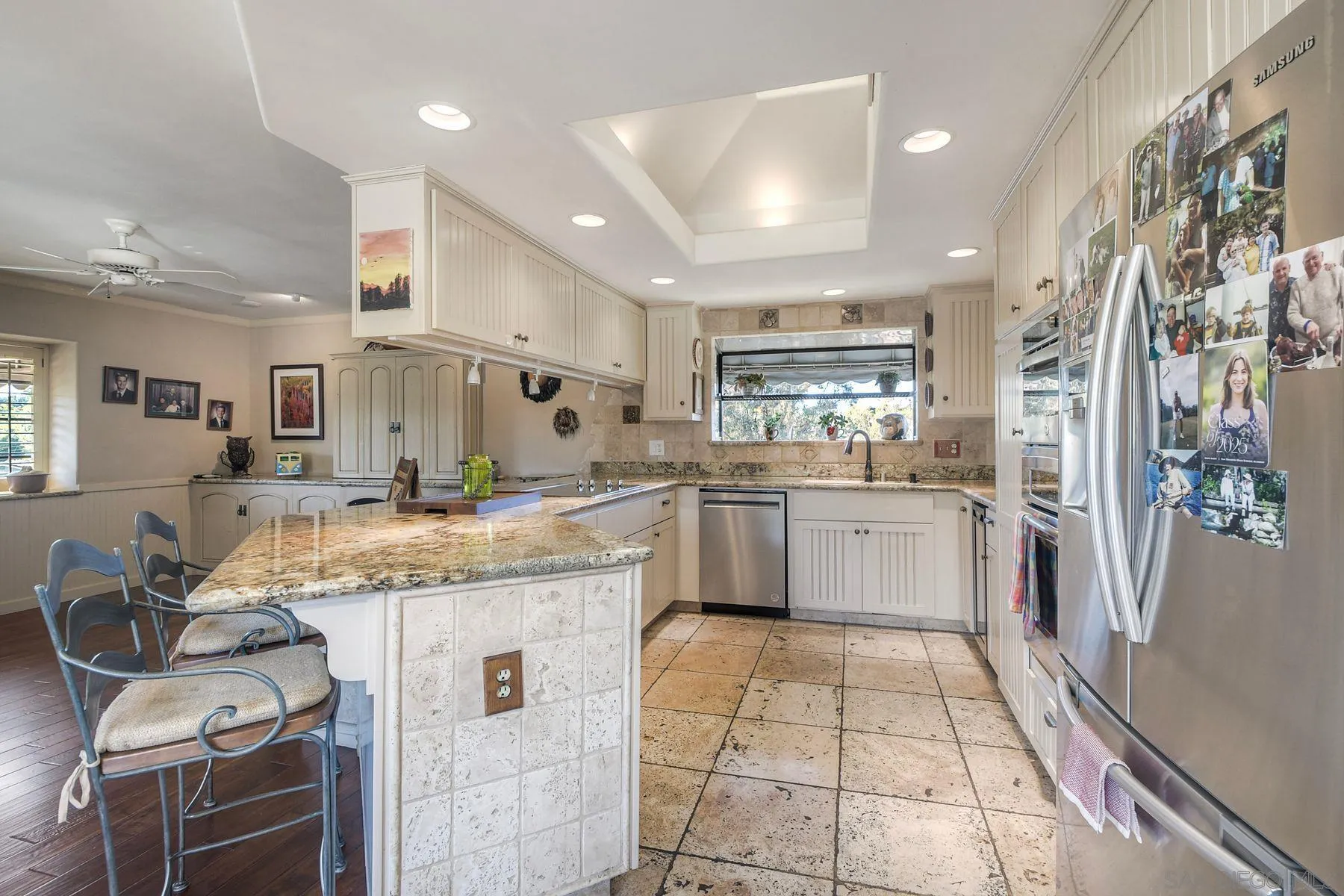 2848 Sunset Hills Escondido, CA 92025 - Photo 23 of 67 a large white kitchen with a large window