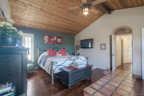 a lobby with a potted plant and a potted plant