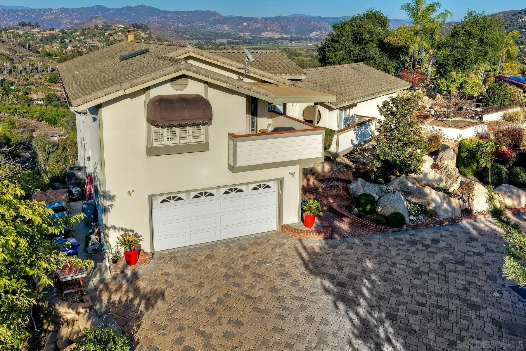 2848 Sunset Hills Escondido, CA 92025 - Photo 57 of 67 an aerial view of a house with a yard and garage