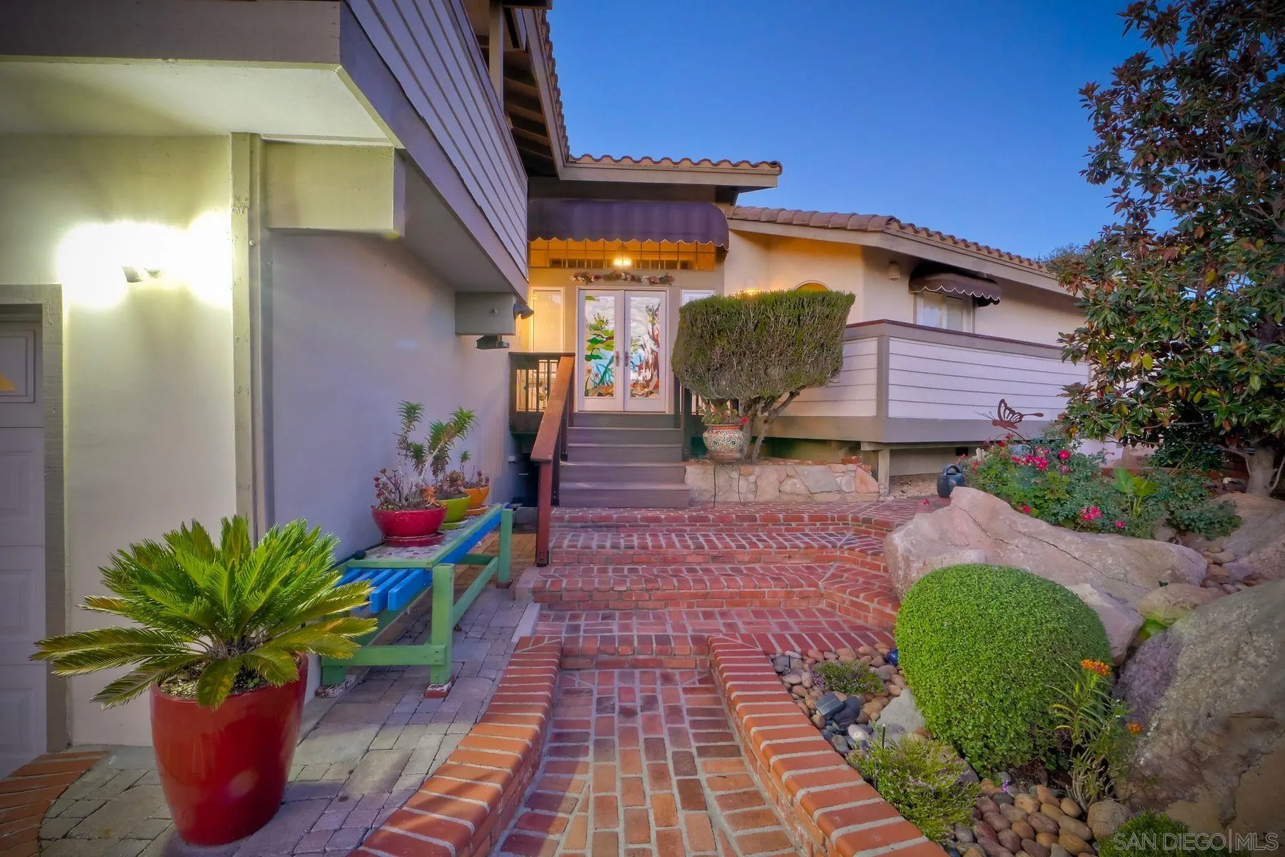 2848 Sunset Hills Escondido, CA 92025 - Photo 9 of 67 a front view of a house with a yard