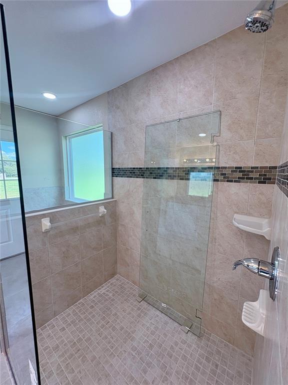 274 Southeast 34th Place Ocala, FL 34471 - Photo 48 of 97 a bathroom with a shower