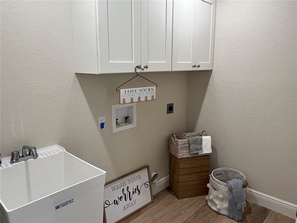 274 Southeast 34th Place Ocala, FL 34471 - Photo 61 of 89 a view of storage and utility room with washer and dryer