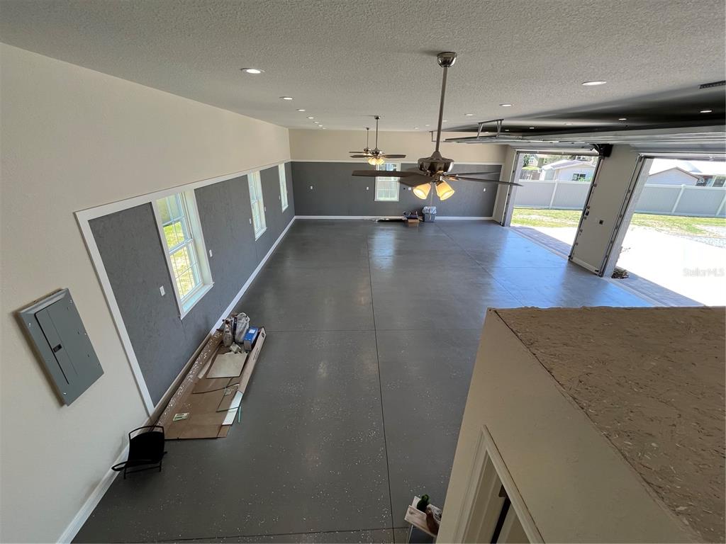 274 Southeast 34th Place Ocala, FL 34471 - Photo 73 of 89 a view of a living room with furniture and a flat screen tv
