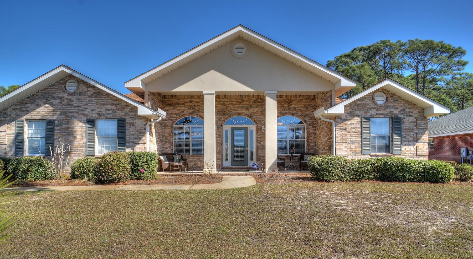 588 East Shipwreck Road Santa Rosa Beach, FL 32459 - Photo 1 of 29 a front view of a house with a yard