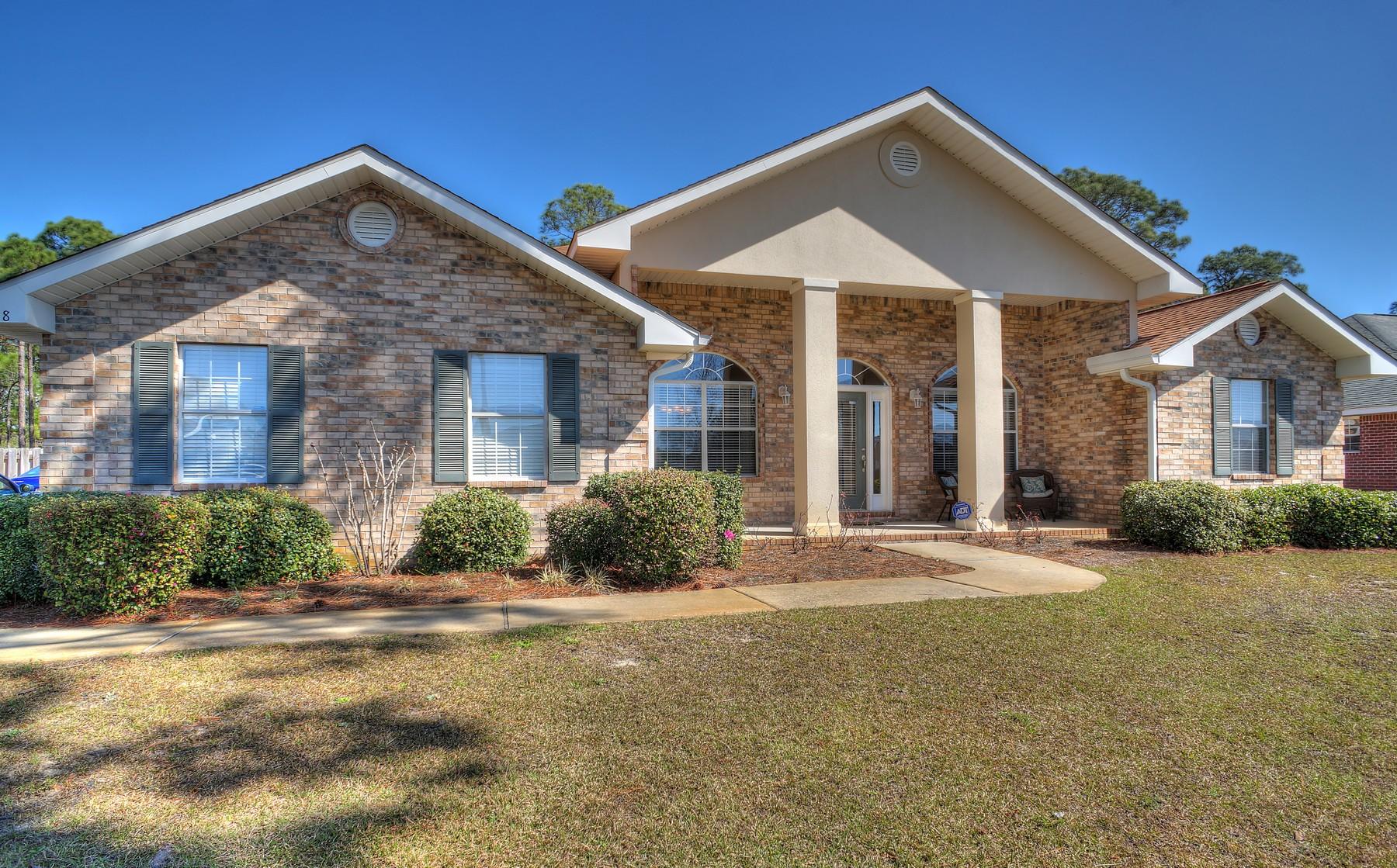 588 East Shipwreck Road Santa Rosa Beach, FL 32459 - Photo 2 of 29 a front view of a house with a yard