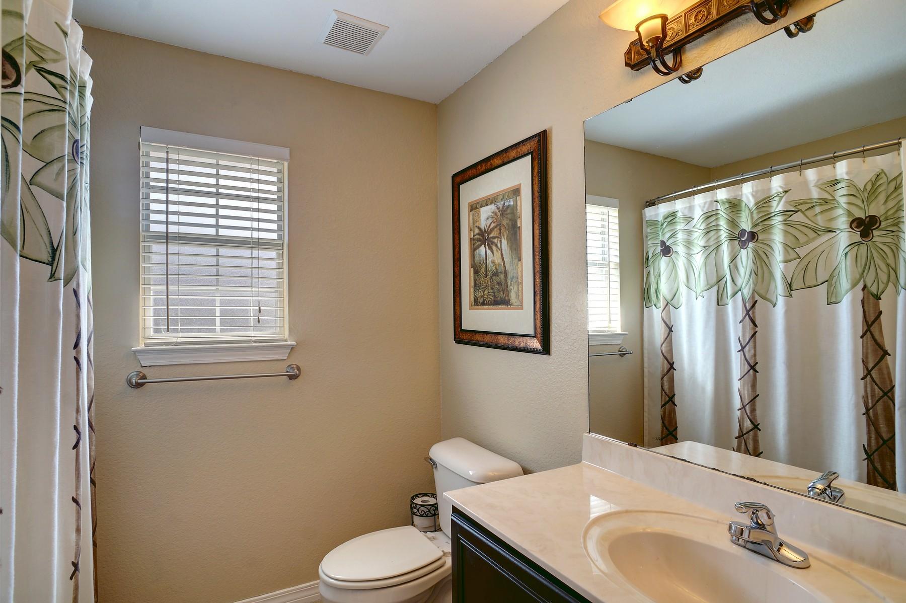 588 East Shipwreck Road Santa Rosa Beach, FL 32459 - Photo 21 of 29 a bathroom with a sink toilet and shower