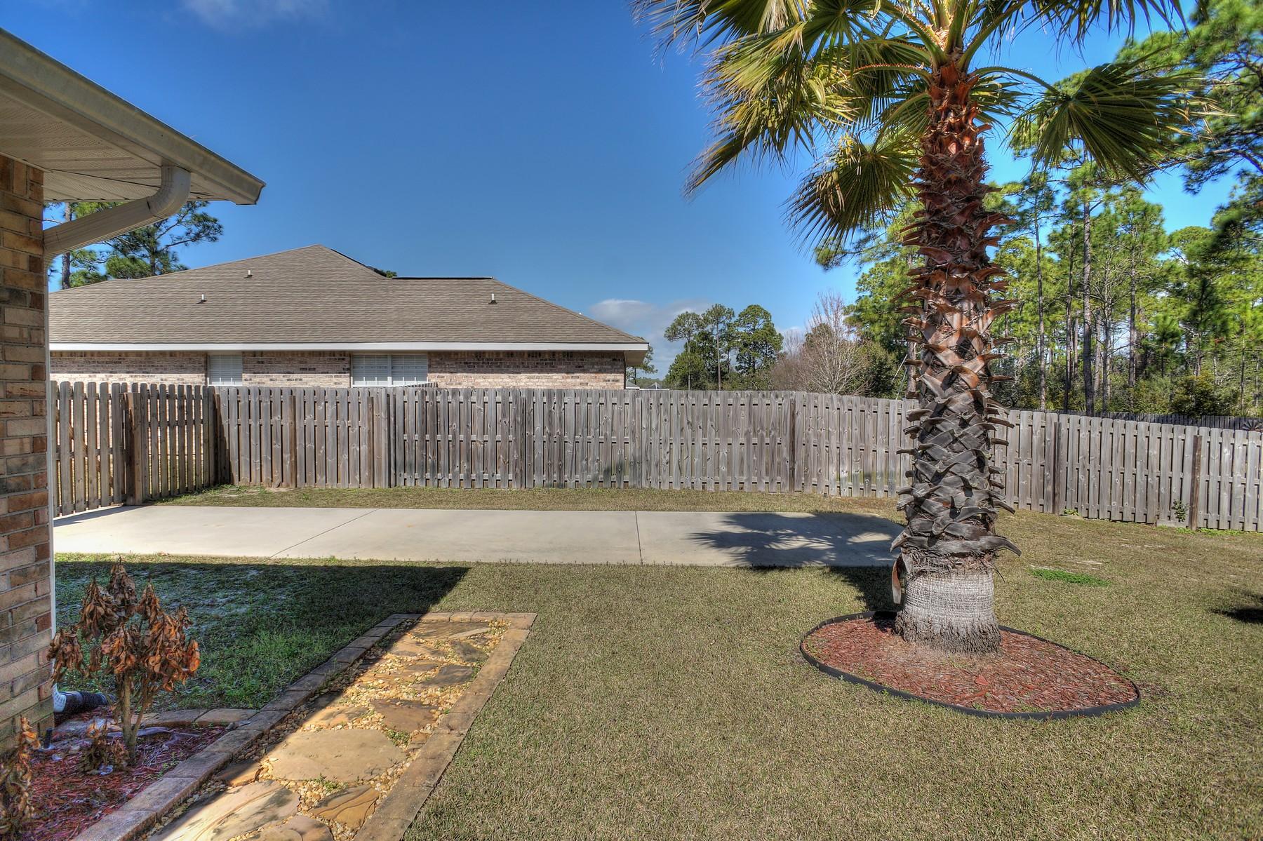 588 East Shipwreck Road Santa Rosa Beach, FL 32459 - Photo 25 of 29 a swimming pool with wooden fence