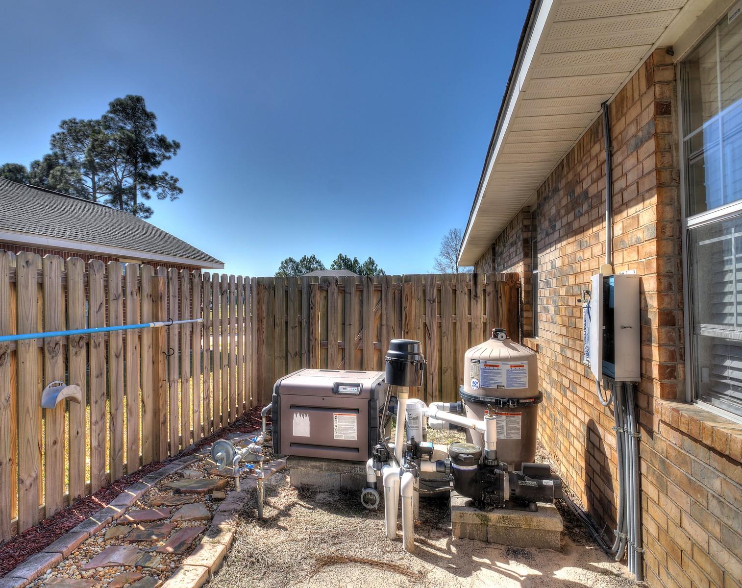588 East Shipwreck Road Santa Rosa Beach, FL 32459 - Photo 27 of 29 a backyard of a house with table and chairs