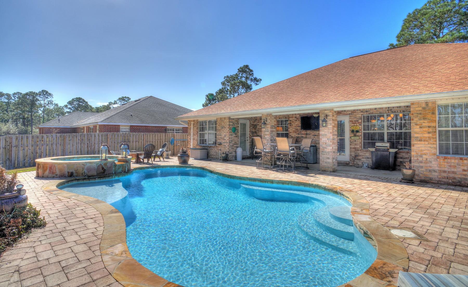 588 East Shipwreck Road Santa Rosa Beach, FL 32459 - Photo 28 of 29 a view of a house with swimming pool and sitting area
