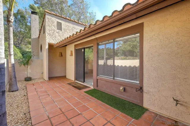 a porch with seating space