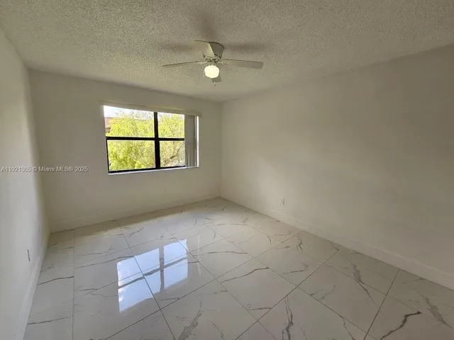 an empty room with a bathroom