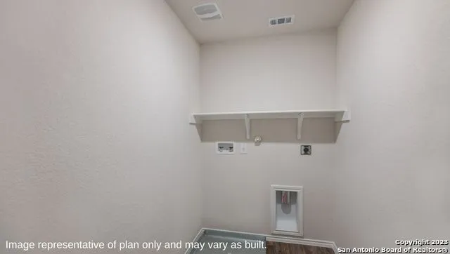 a picture of a bench in a white wall