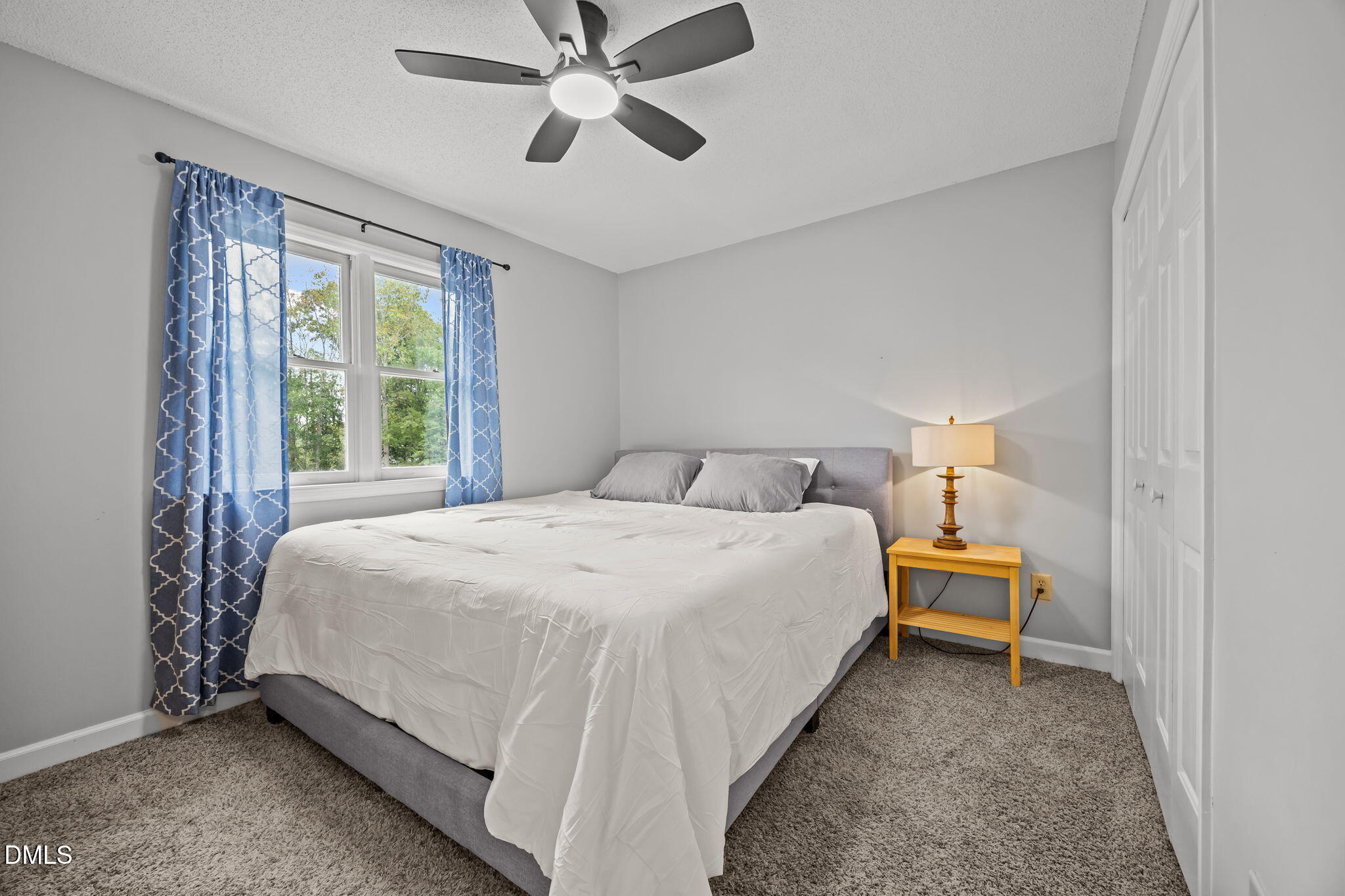 1626 Oakland Hills Way Raleigh, NC 27604 - Photo 13 of 23 a bedroom with a bed and window