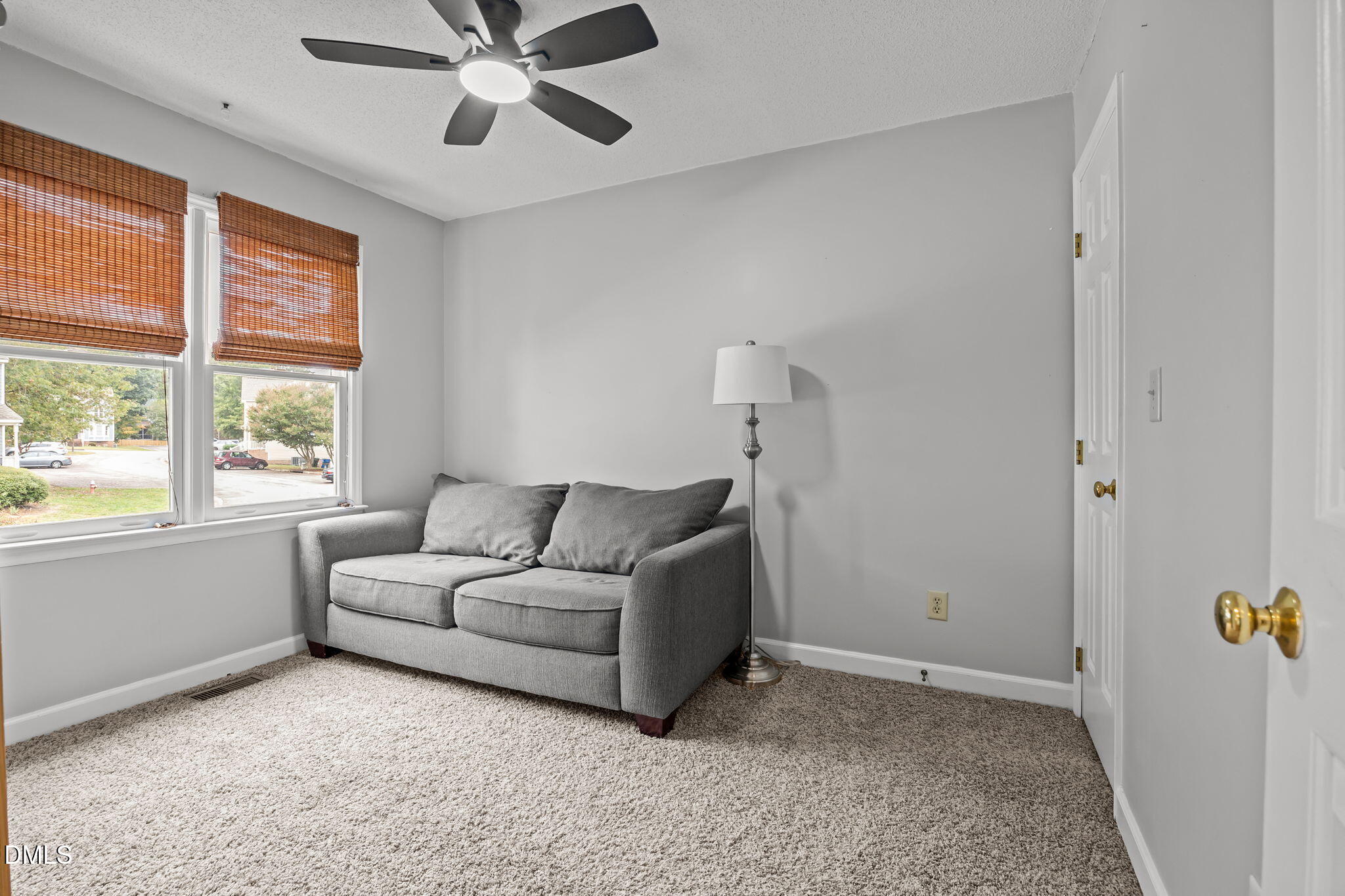 1626 Oakland Hills Way Raleigh, NC 27604 - Photo 14 of 23 a living room with furniture and window