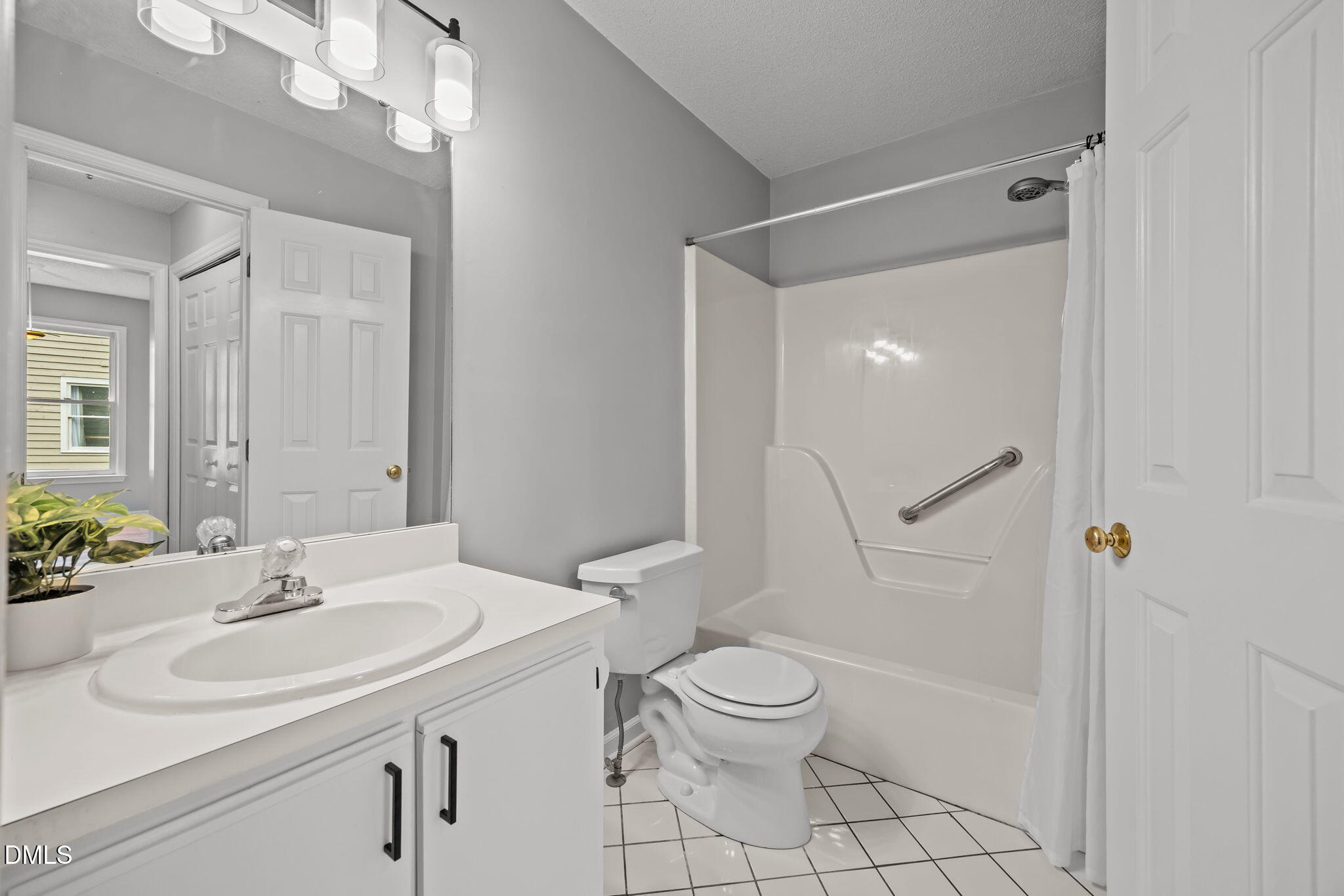 1626 Oakland Hills Way Raleigh, NC 27604 - Photo 16 of 23 a bathroom with a sink toilet and shower