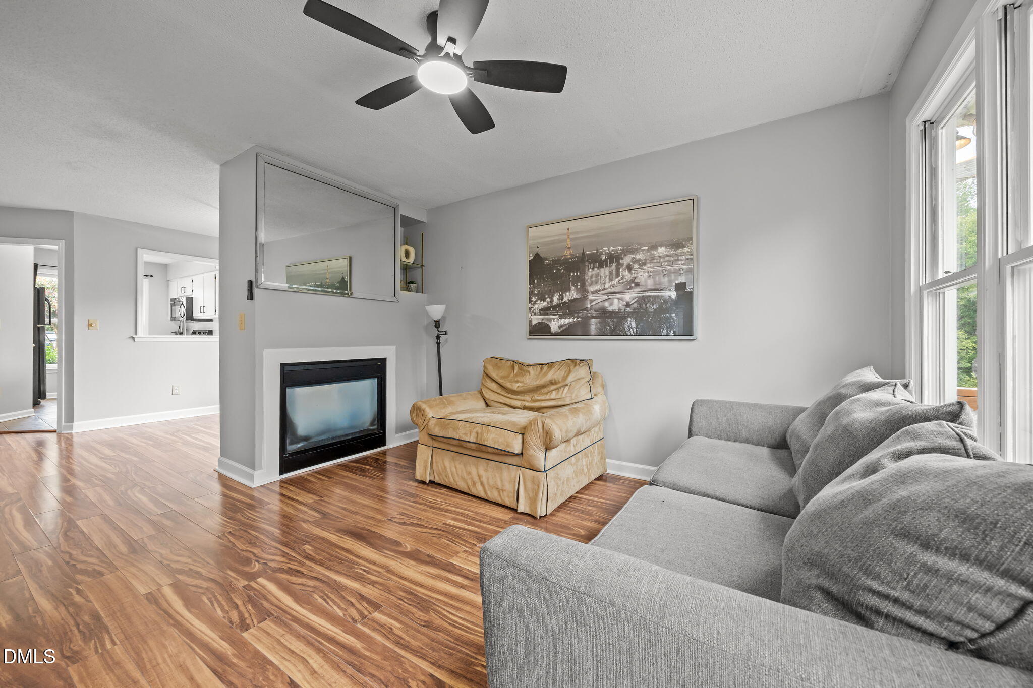 1626 Oakland Hills Way Raleigh, NC 27604 - Photo 4 of 23 a living room with furniture and a fireplace