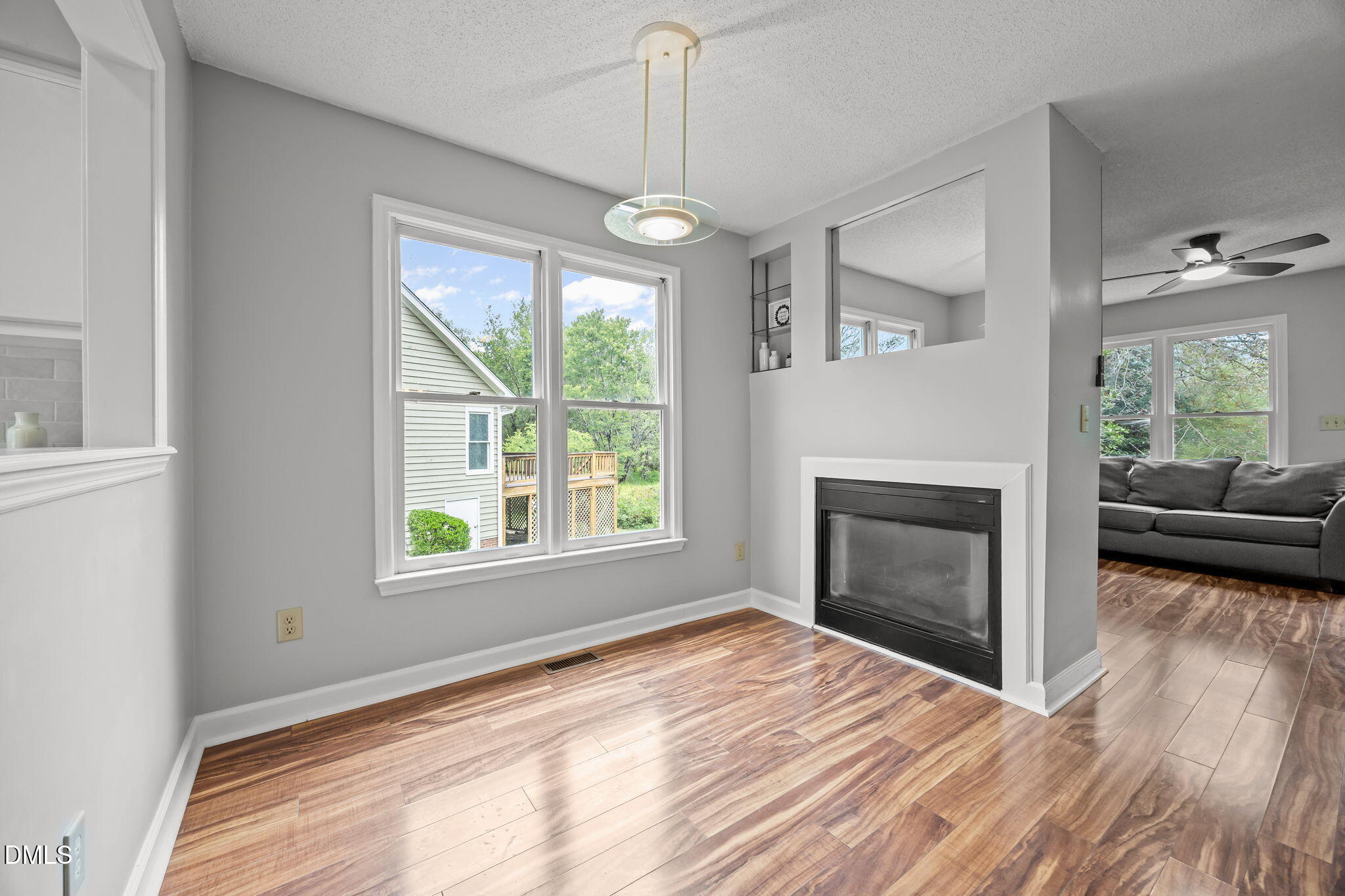 1626 Oakland Hills Way Raleigh, NC 27604 - Photo 6 of 23 a view of livingroom window and hardwood floor