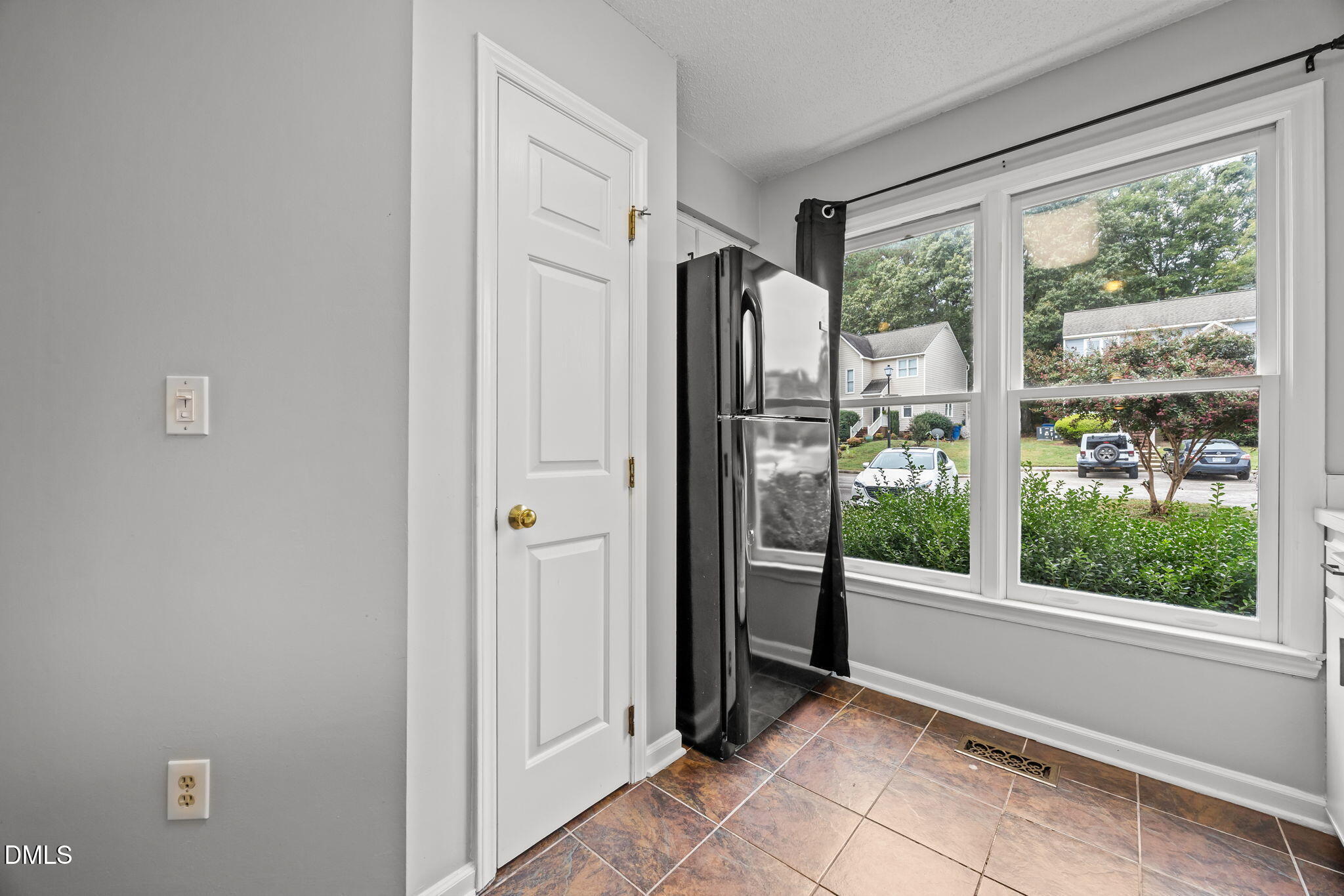 1626 Oakland Hills Way Raleigh, NC 27604 - Photo 9 of 23 a view of entryway with window and front door