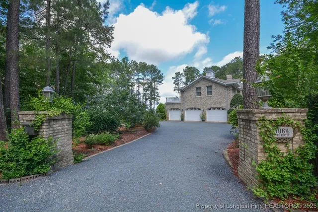 a view of a house with a street