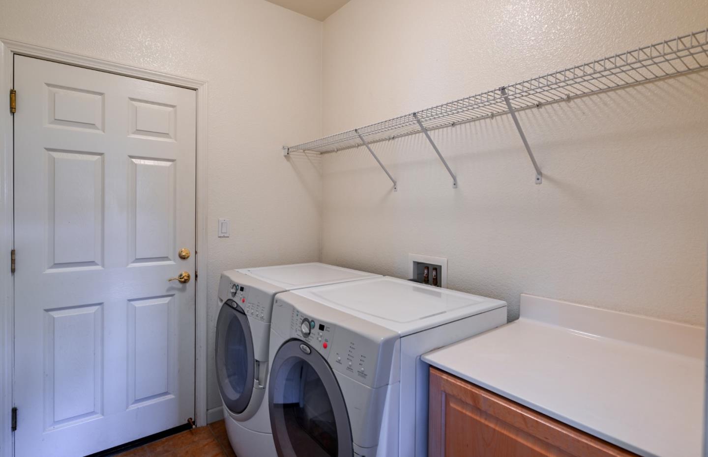 4190 Peninsula Point Drive Seaside, CA 93955 - Photo 12 of 30 a utility room with dryer and washer