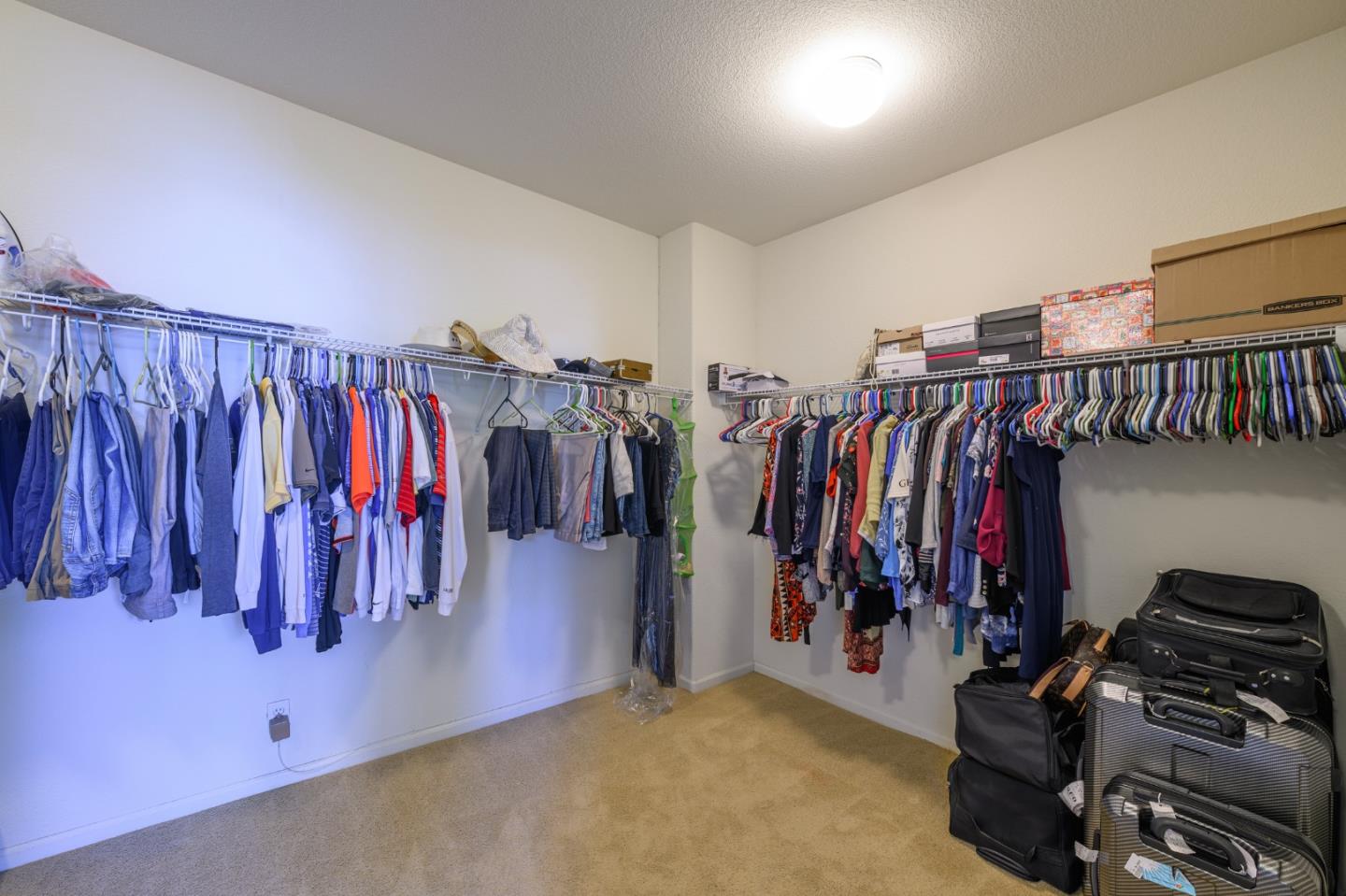 4190 Peninsula Point Drive Seaside, CA 93955 - Photo 20 of 30 a view of walk in closet with clothes