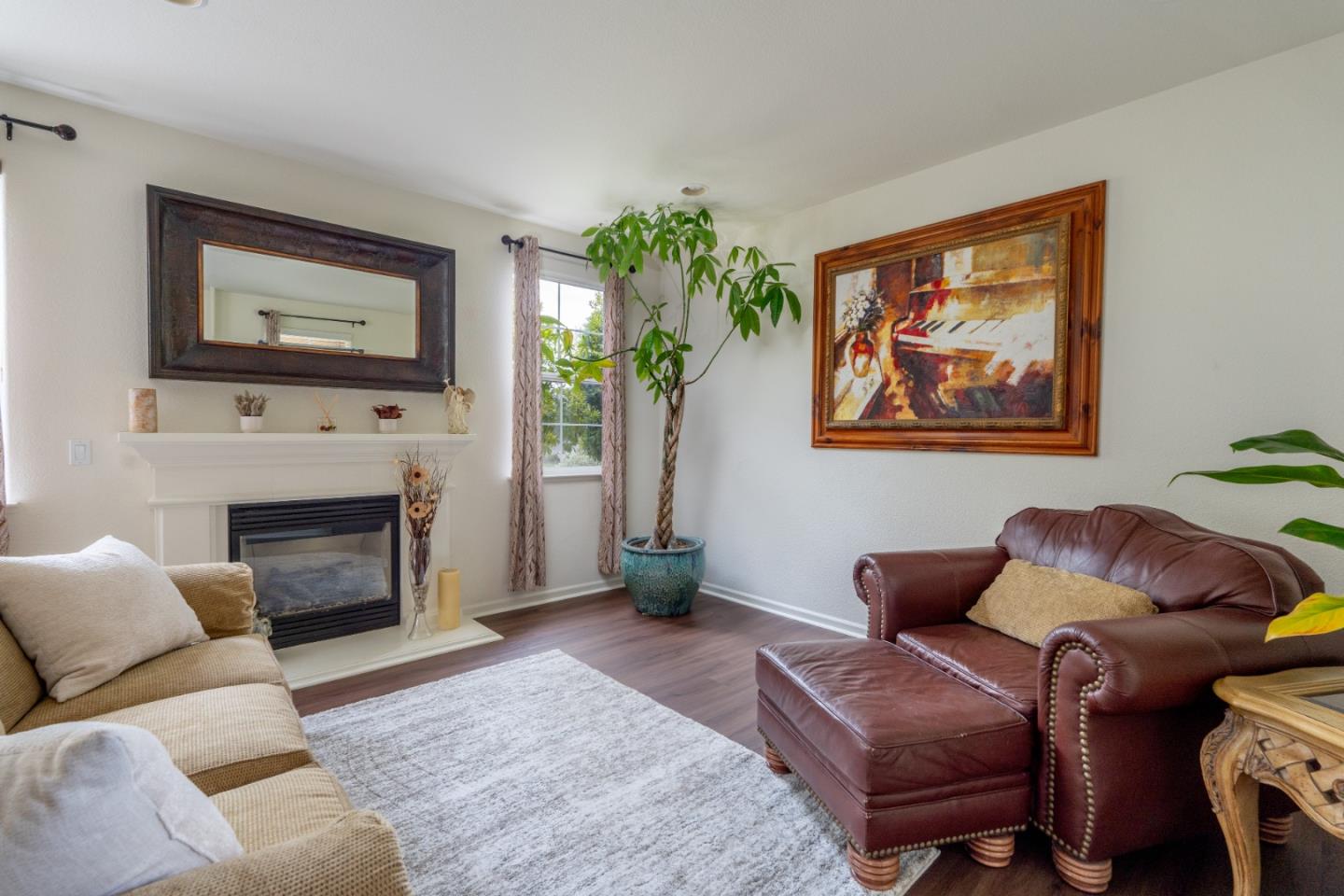 4190 Peninsula Point Drive Seaside, CA 93955 - Photo 2 of 30 a living room with furniture and a fireplace