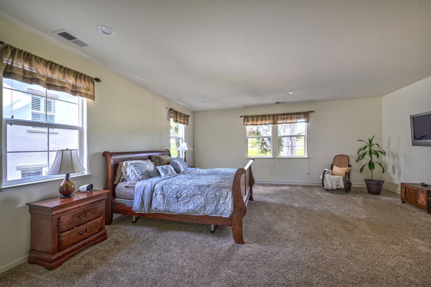 4190 Peninsula Point Drive Seaside, CA 93955 - Photo 21 of 30 a bed room with furniture and a window