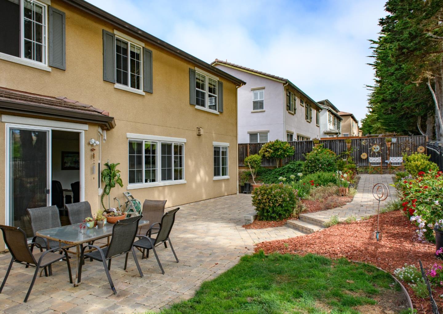 4190 Peninsula Point Drive Seaside, CA 93955 - Photo 22 of 30 a view of a house with backyard and sitting area
