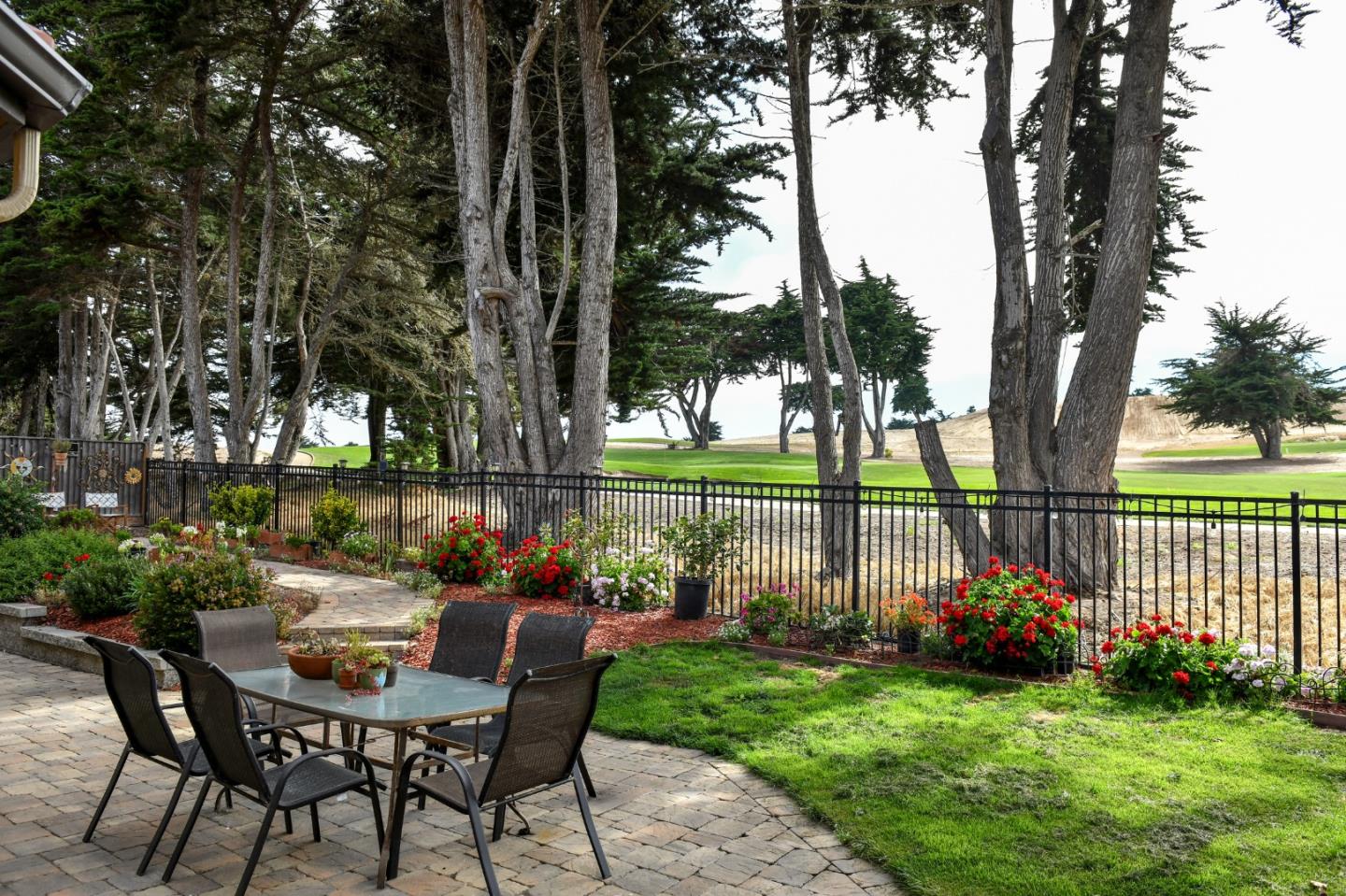 4190 Peninsula Point Drive Seaside, CA 93955 - Photo 24 of 30 a view of a house with backyard and a tree