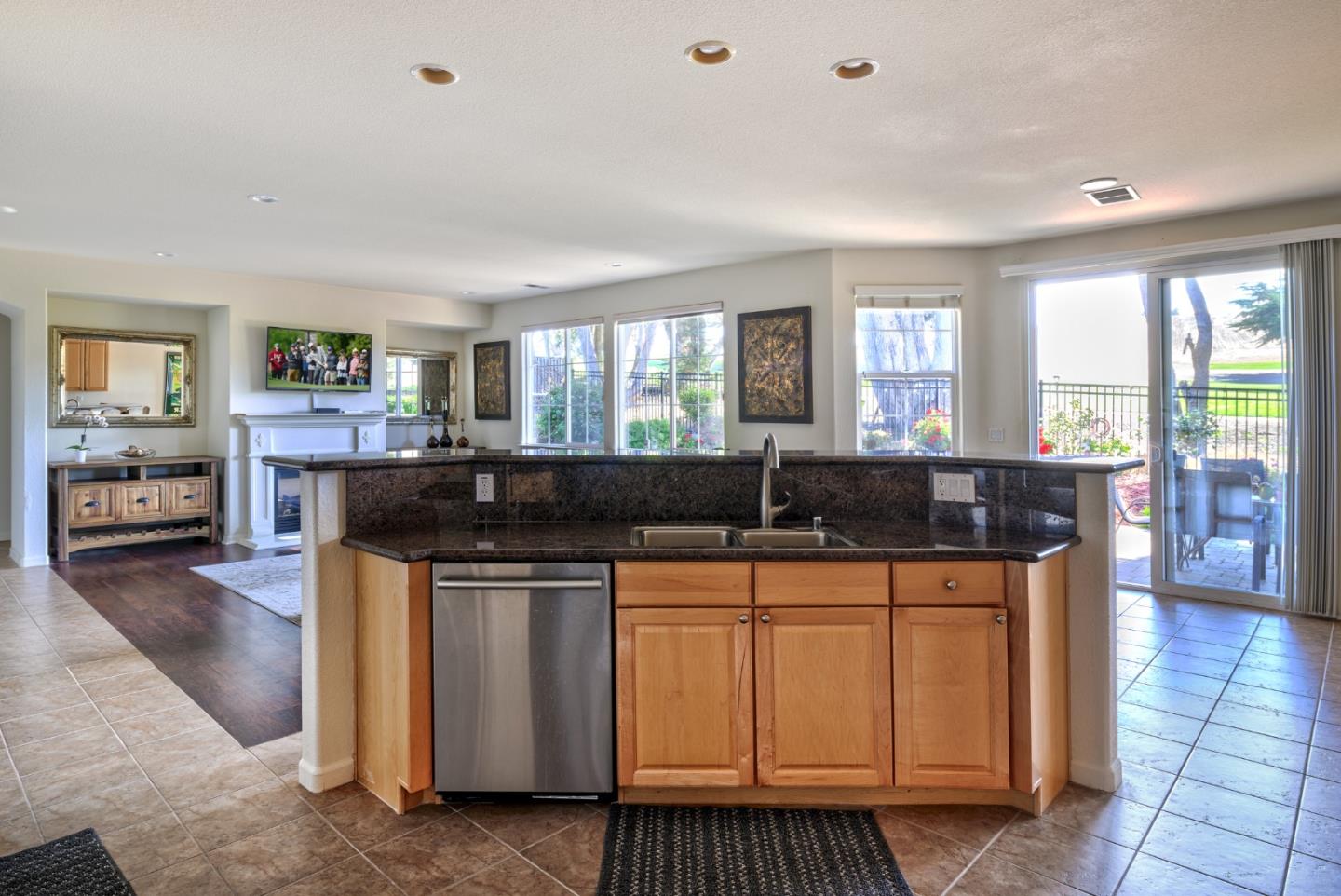 4190 Peninsula Point Drive Seaside, CA 93955 - Photo 6 of 30 a kitchen with stainless steel appliances granite countertop a stove a sink and a refrigerator