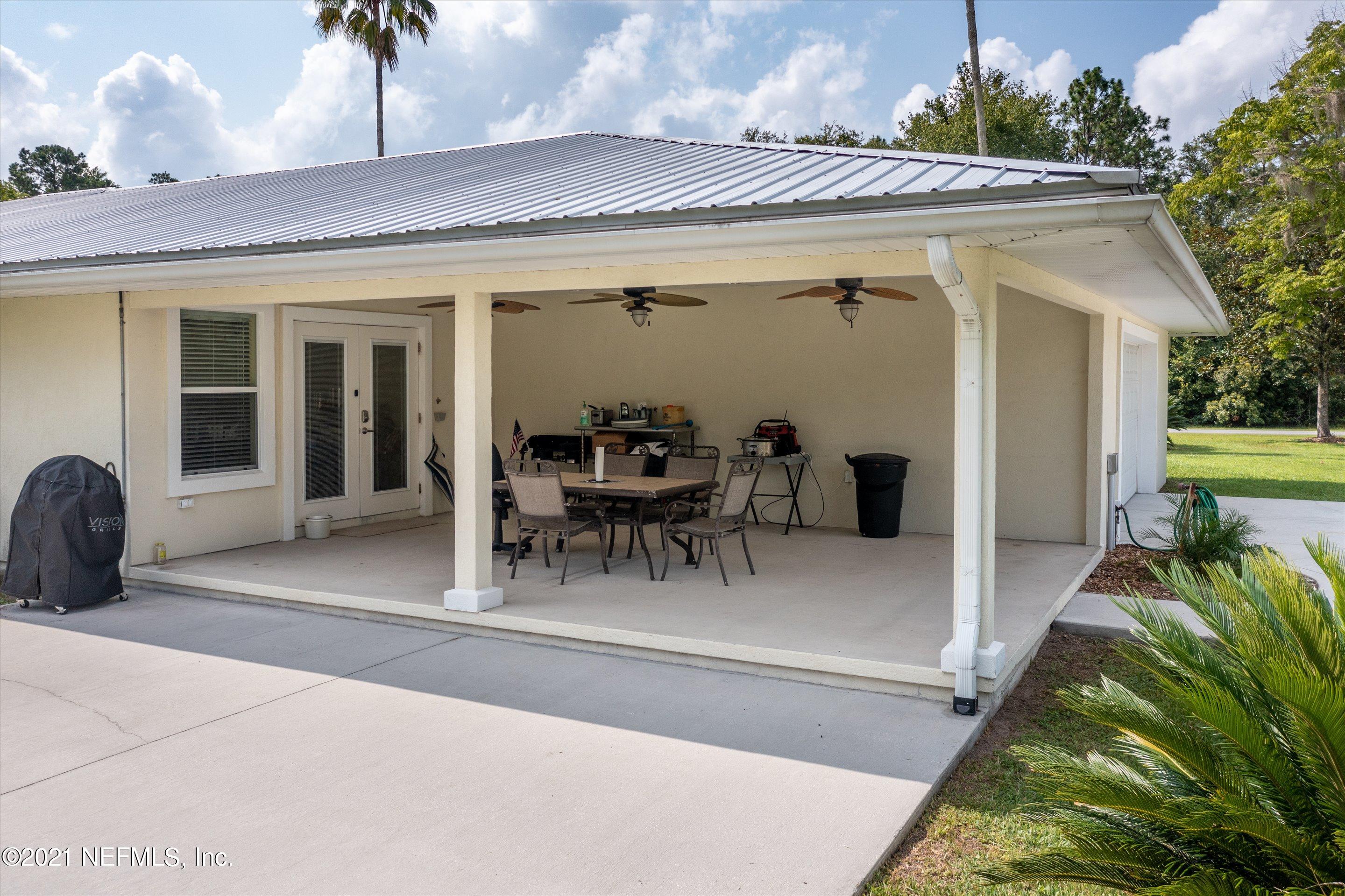 241 Holly Knowe Road Fleming Island, FL 32003 - Photo 24 of 28 Covered Patio