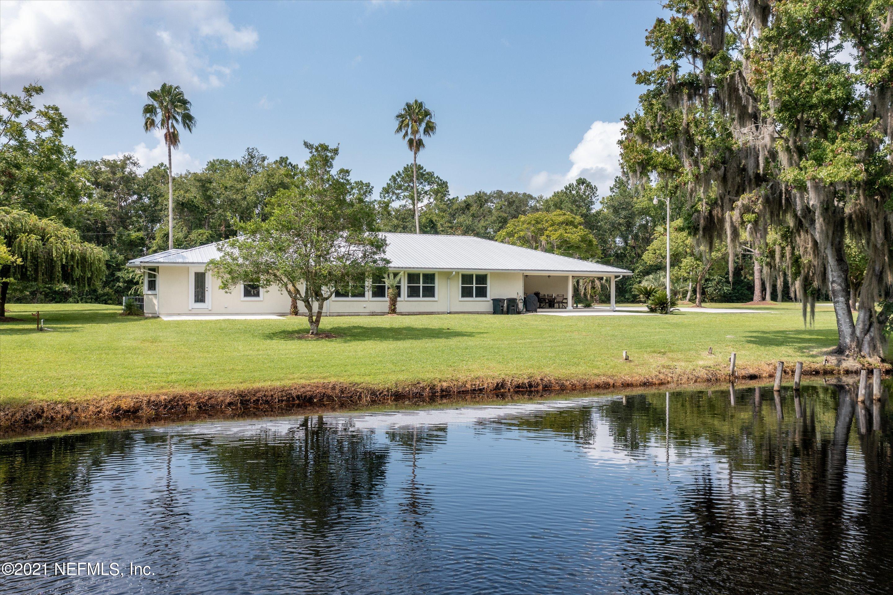 241 Holly Knowe Road Fleming Island, FL 32003 - Photo 25 of 28 Back from lake